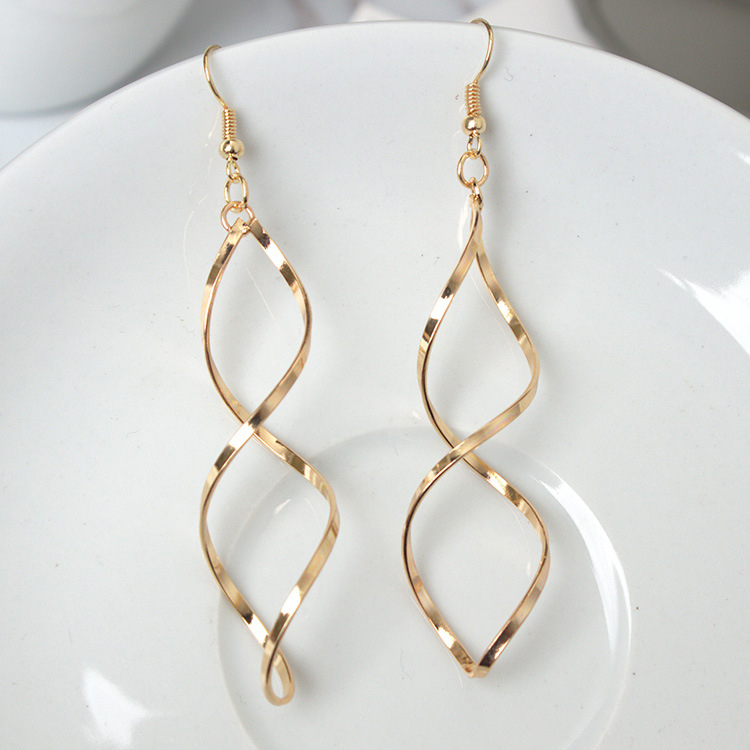 Golden Asymmetrical Twist Design Metal Detail Earrings | picture 