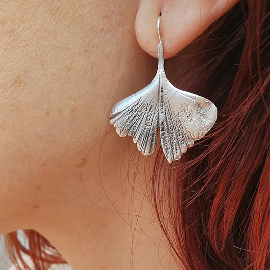 Silvery White Leaf Asymmetry Alloy Earrings