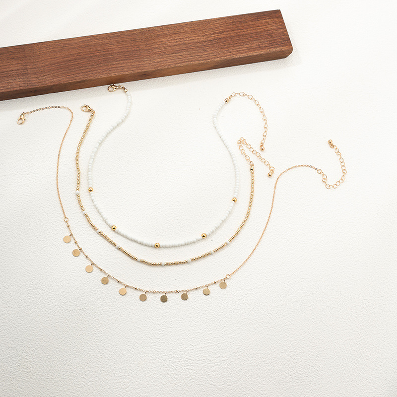 Gold Plastic Beaded Tassel Necklace Set