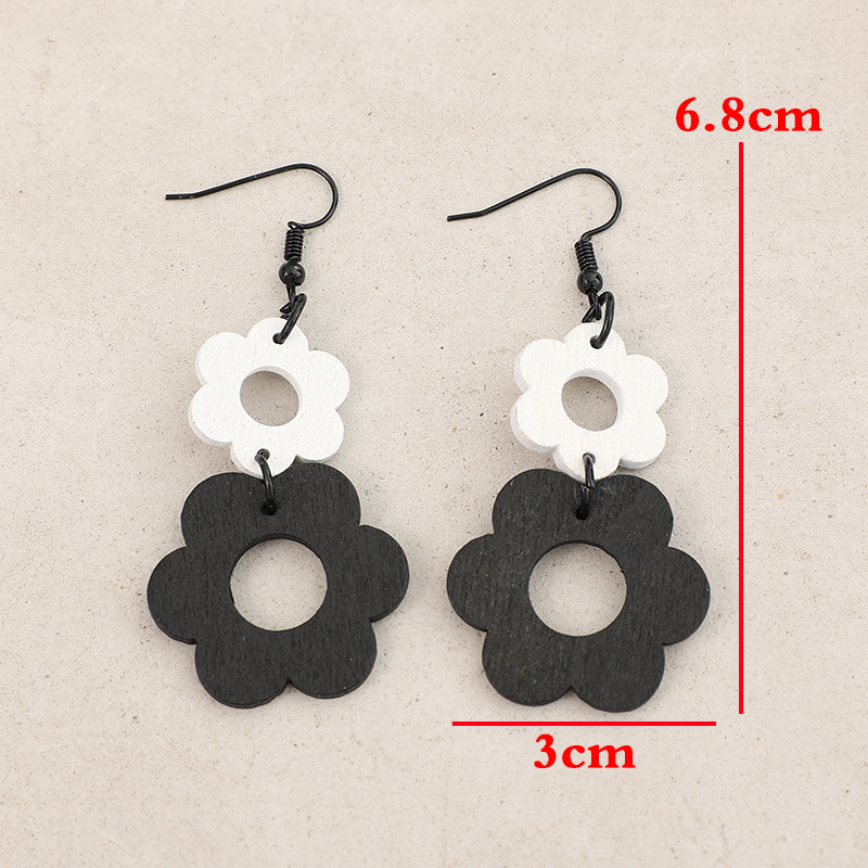 Black Hollow Wood Floral Design Earrings | picture 