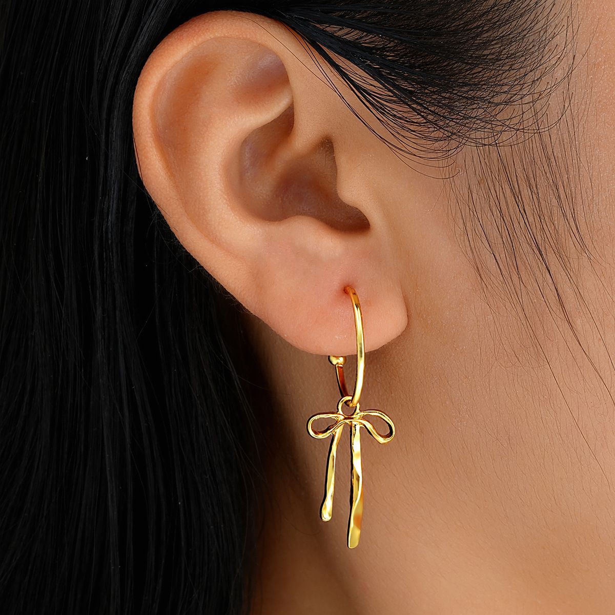Golden Bow Alloy Tassel Design Earrings | picture 