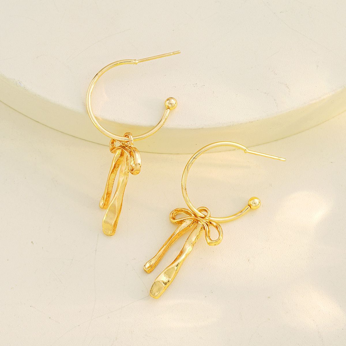 Golden Bow Alloy Tassel Design Earrings | picture 