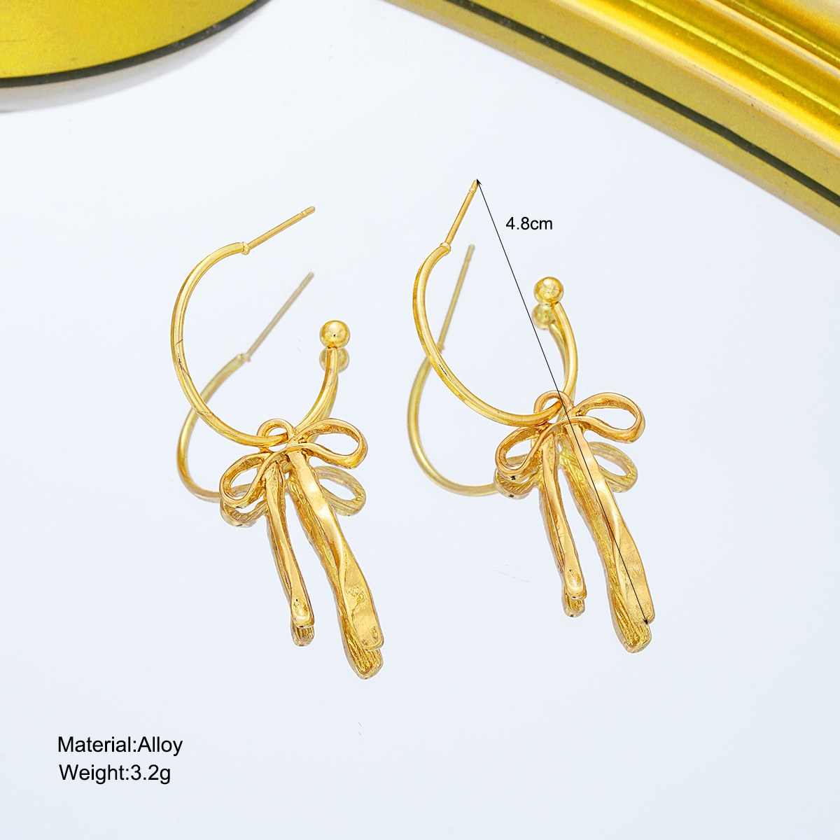 Golden Bow Alloy Tassel Design Earrings | picture 
