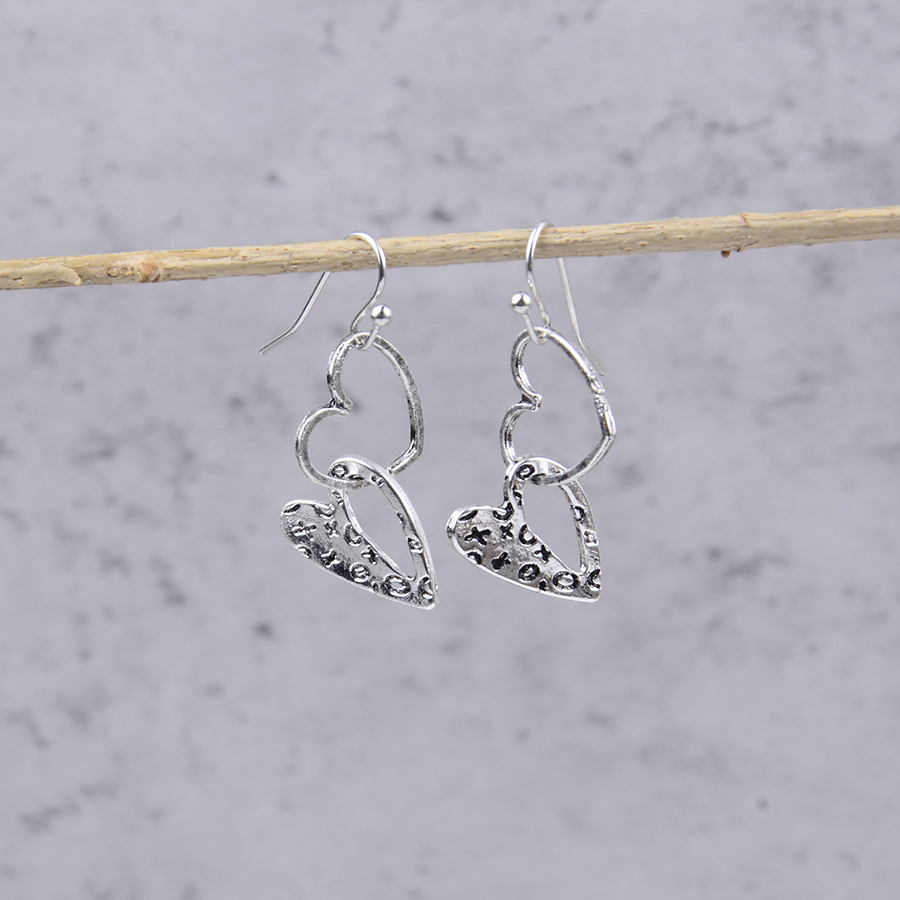 Silver Heart Design Hollow Alloy Earrings | picture 