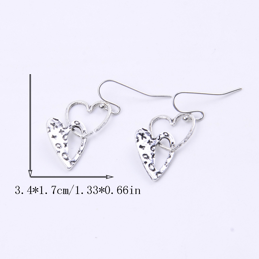 Silver Heart Design Hollow Alloy Earrings | picture 