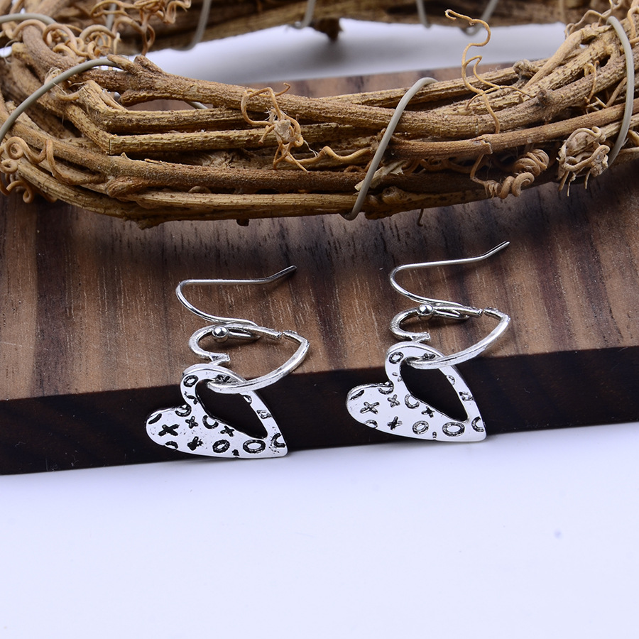 Silver Heart Design Hollow Alloy Earrings | picture 