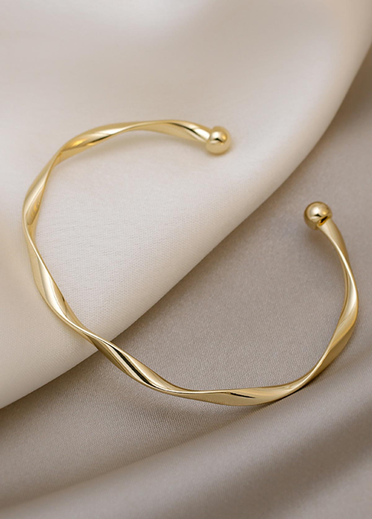 Golden Alloy Open Cuff Twisted Bangle | picture 