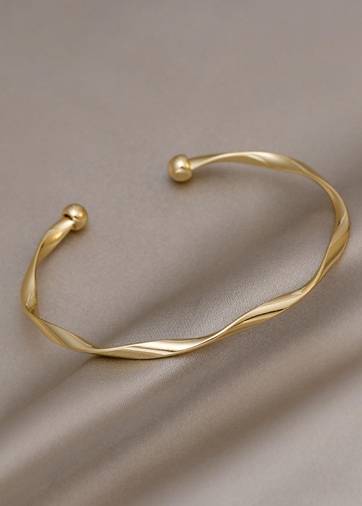 Golden Alloy Open Cuff Twisted Bangle | picture 