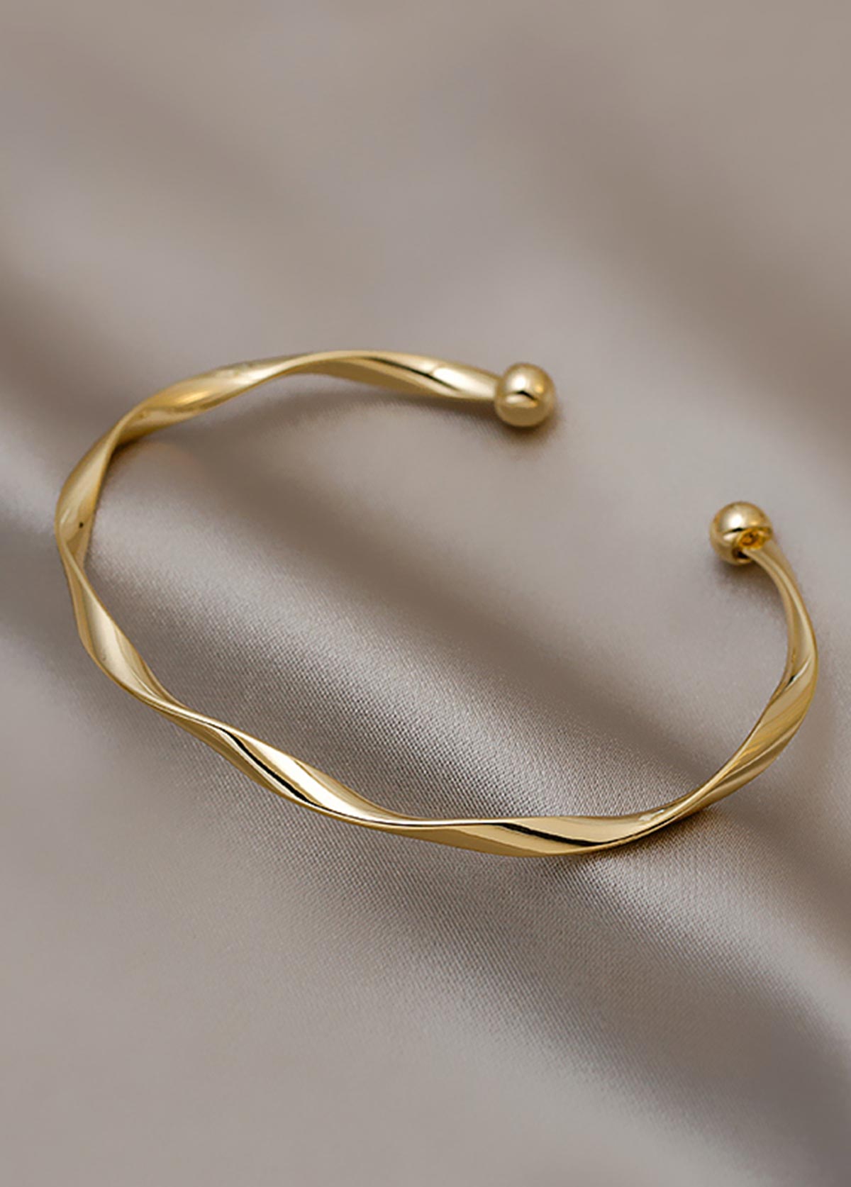 Golden Alloy Open Cuff Twisted Bangle | picture 