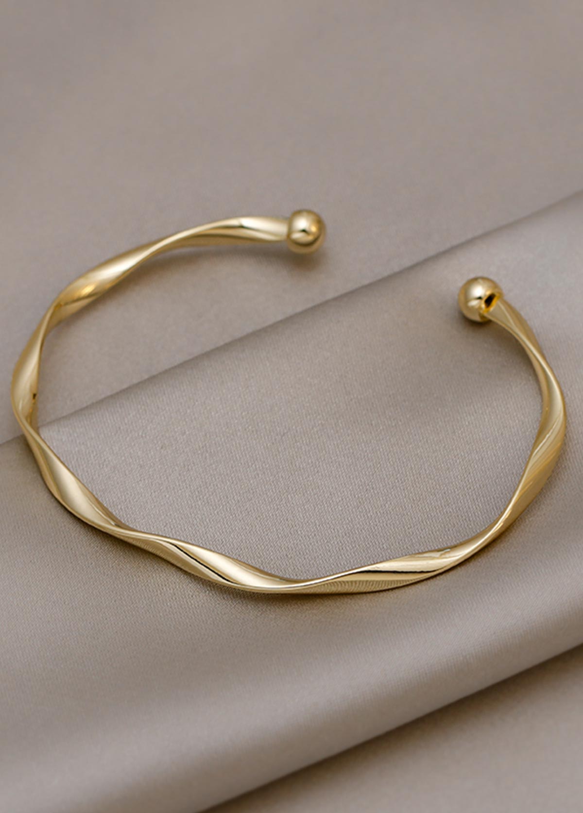 Golden Alloy Open Cuff Twisted Bangle | picture 
