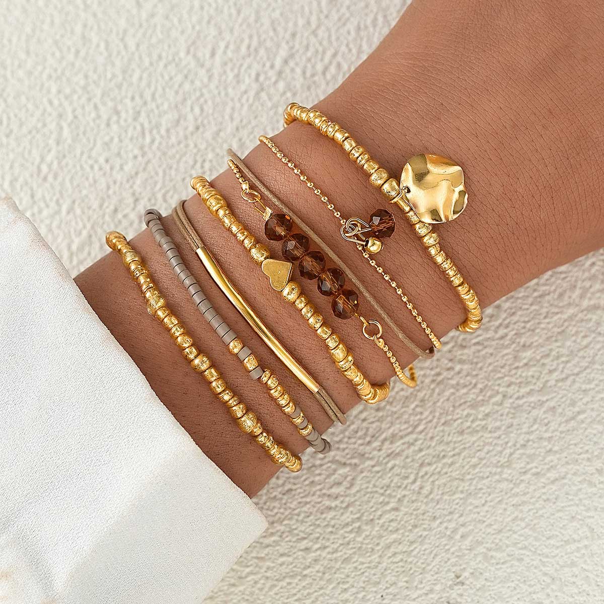 Golden Beaded Geometric Heart Bracelet Set | picture 