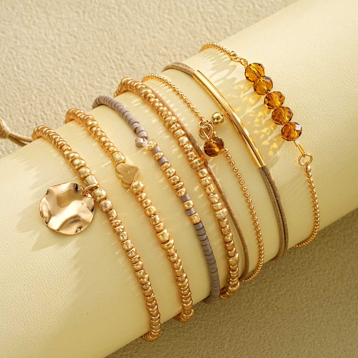 Golden Beaded Geometric Heart Bracelet Set | picture 
