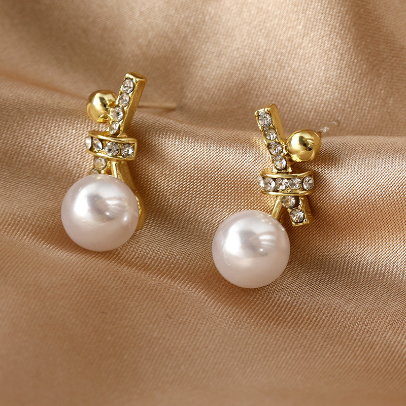 Golden Pearl Bow Design Alloy Earrings | picture 