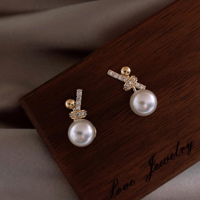 Golden Pearl Bow Design Alloy Earrings | picture 