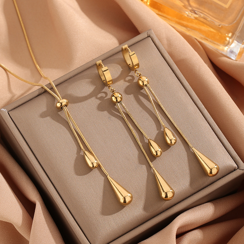Golden Stainless Steel Teardrop Earrings and Necklace | picture 