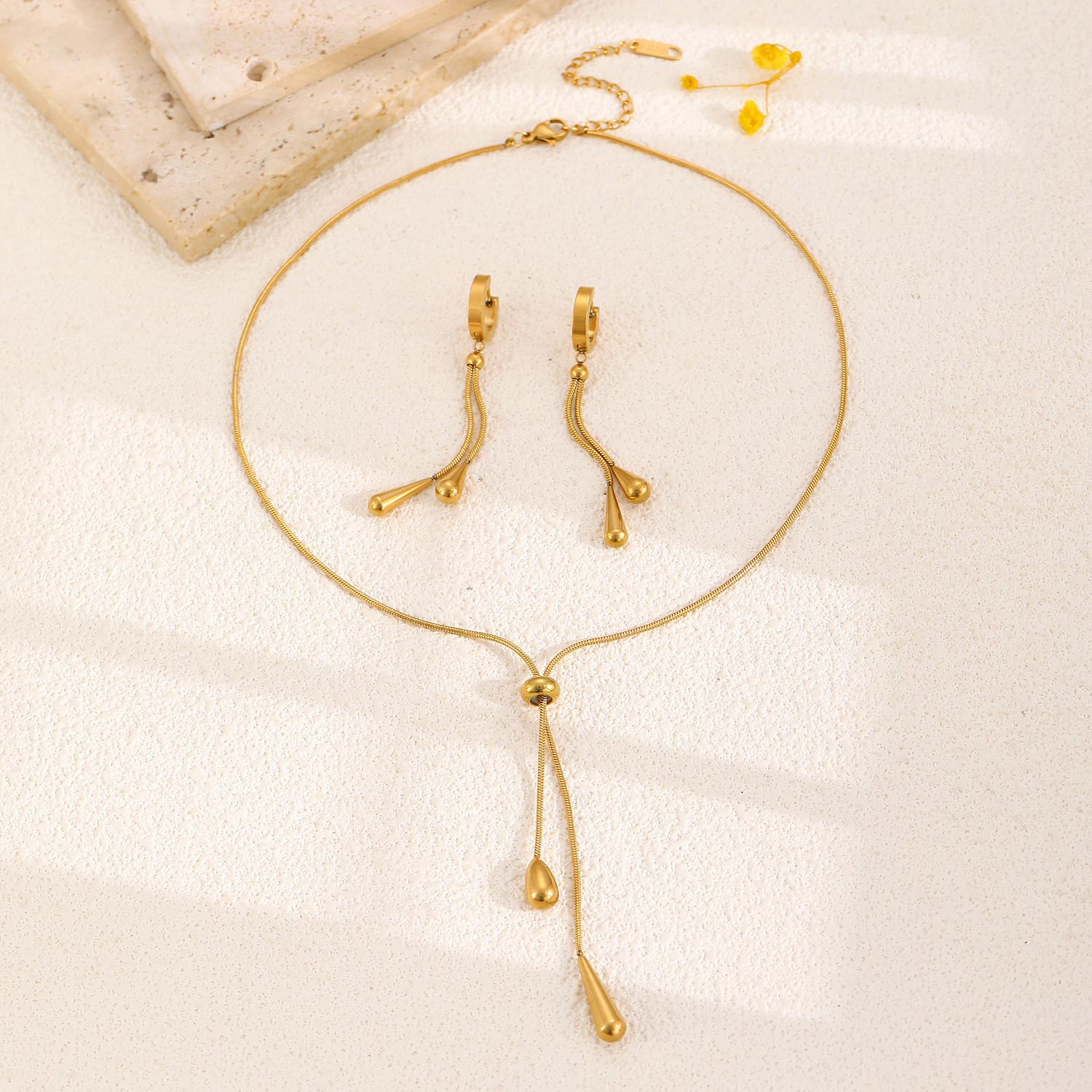 Golden Stainless Steel Teardrop Earrings and Necklace | picture 