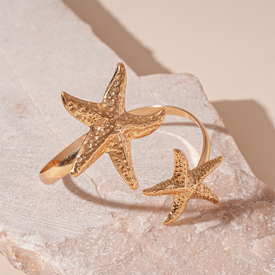 Golden Color Starfish Metal Detail Bangle | picture 