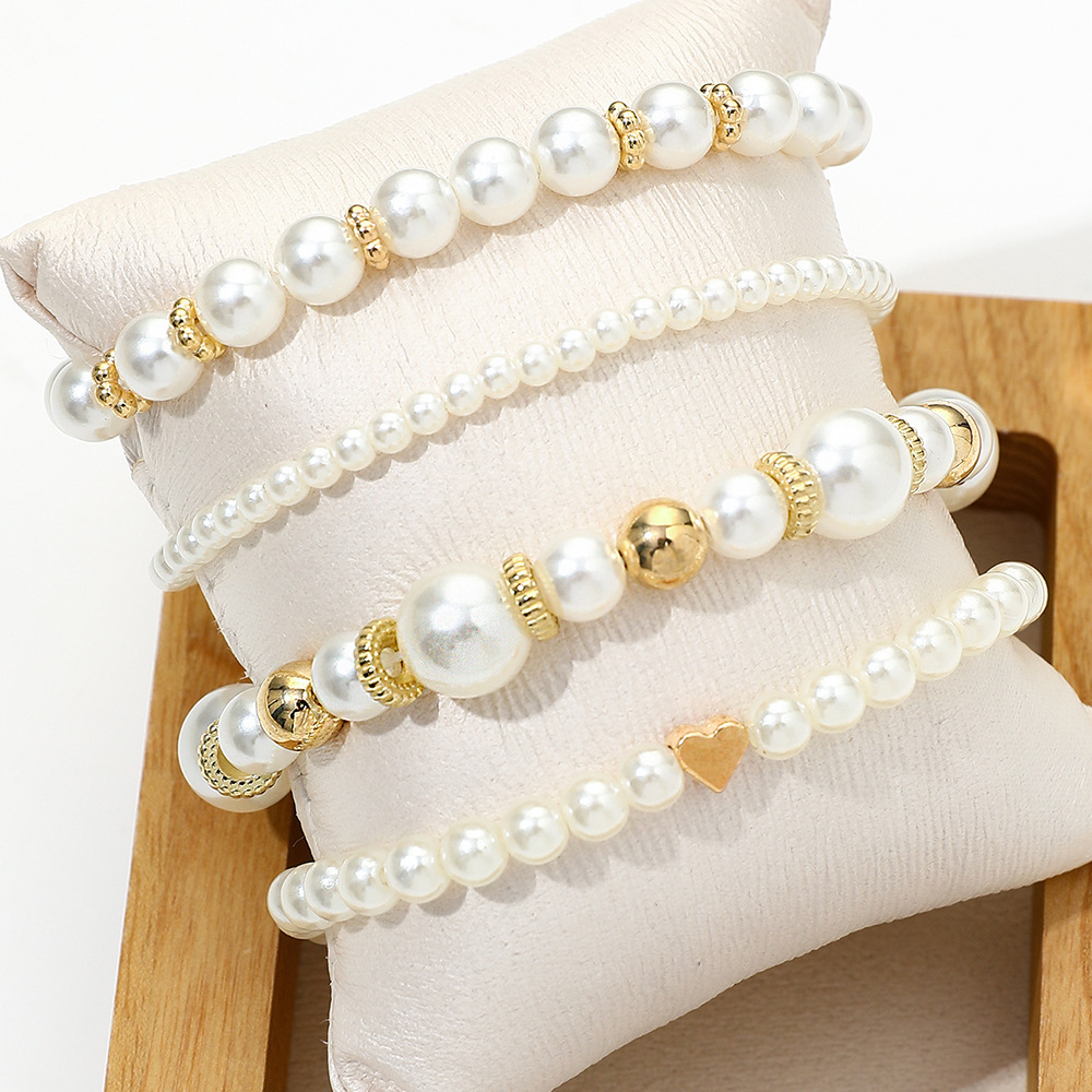 Golden Heart Design Round Pearl Bracelets | picture 