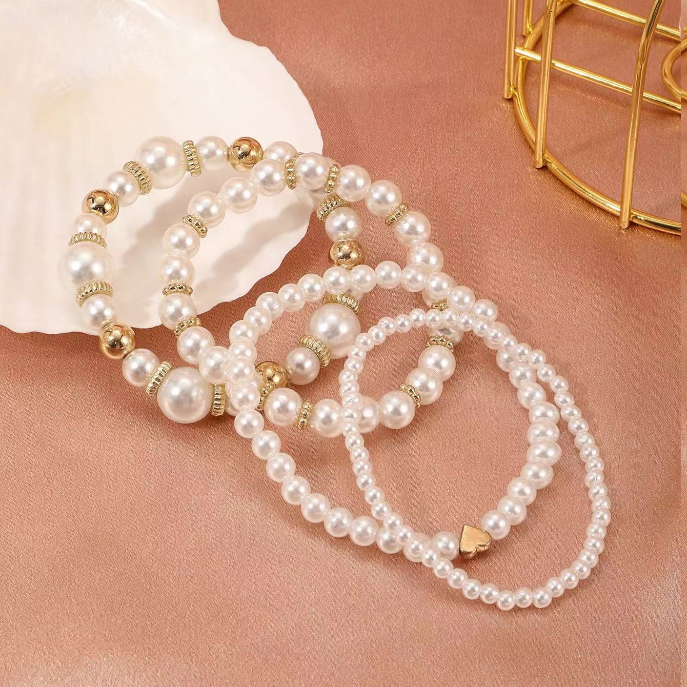 Golden Heart Design Round Pearl Bracelets | picture 