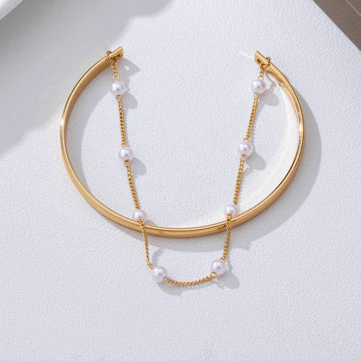 Golden Iron Layered Design Pearl Bangle | picture 