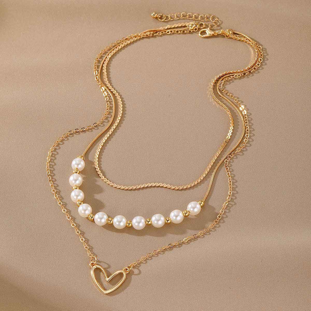 Golden Heart Metal Pearl Layered Design Necklace | picture 