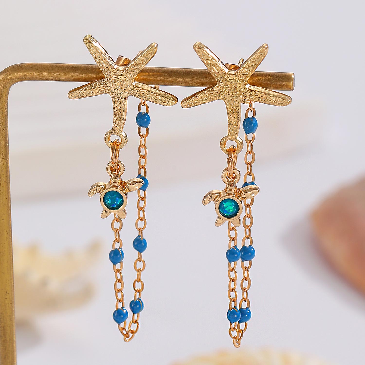 Golden Turtle Starfish Design Copper Earrings | picture 