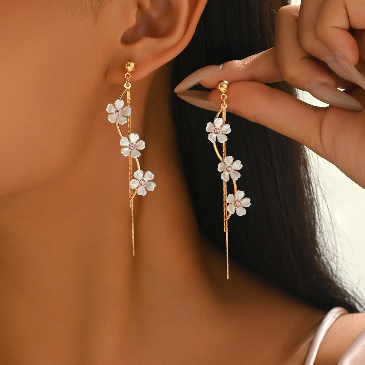 Golden Flower Tassel Design Plastic Earrings | picture 
